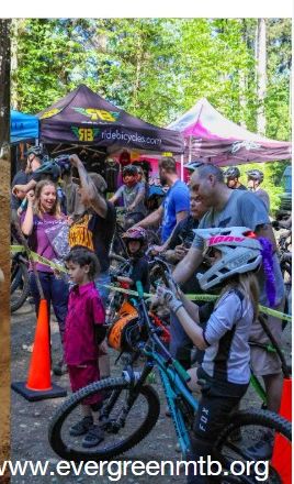 Community mountain bike event with kids and volunteers