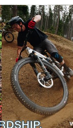Mountain biker cornering on a berm
